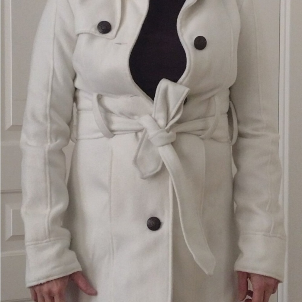 Nice white coat. Fabric is combination of polyester, viscose and spandex. Index.